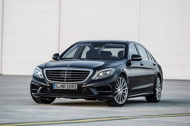 Black luxury executive sedan front view for airport chauffeur transfers